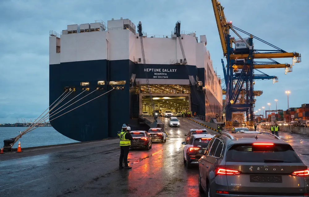 Cars driven up the ramp of a RoRo car carrier
